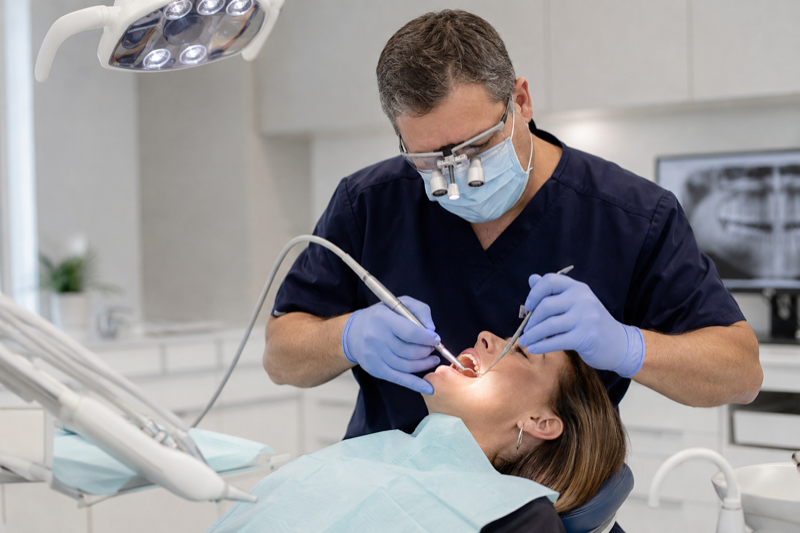 Professional teeth cleaning and gum care at a dental clinic